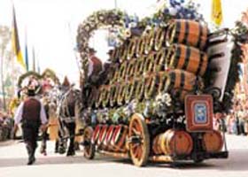 A cart with beer barrels takes part in a parade during the opening of the 177th Oktoberfest in Munich