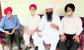 Uttarakhand Minority Commission chief Sukhdev Singh Namdhari with Gyan Godri Gurdwara Committee members at Gurukul Kangri University in Haridwar on Sunday.