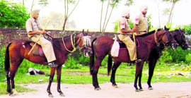 Mounted cops during surveillance for an event at Chhapar village, near Ahmedgarh