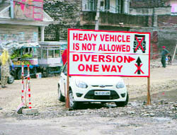 Despite boards put up by the authorities, heavy vehicles use the Gurthali bridge at Doraha