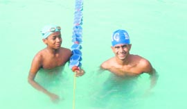Two swimmers at the Brar Invitational Inter-School Swimming Meet in Mussoorie.