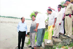 Panipat district officials assess the flood situation on Monday.