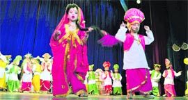 Children perform during a cultural programme at Auckland School in Shimla on Monday.