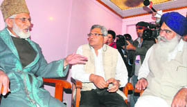 MPs with Geelani at his residence.