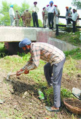 The passage, meant for the outlet of clogged water, under the railway bridge is being converted into an underpass at Chali Khu in Amritsar