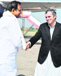 Union Home Minister P. Chidambaram being received by Chief Minister Omar Abdullah at the Srinagar airport