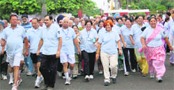 Residents take part in Run for Fun at Sukhna Lake in Chandigarh on Tuesday. 