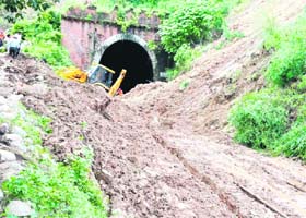 A railway tunnel blocked by a mudslide in Haridwar