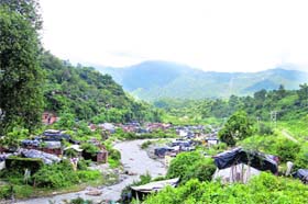 Slums on the banks of a river at Rajpur near Dehradun