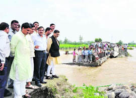 Tarun Vijay, Rajya Sabha MP, inspects flood-affected areas on Tuesday.