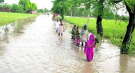 A flooded link road in Karnal district.