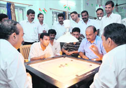 A match of the Carrom Tournament under way in Dehradun on Wednesday.