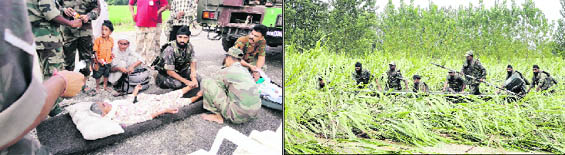 Personnel of the Bengal Sappers provide medical aid to an old woman; and (right) pass through a sugarcane field in their boat to rescue marooned villagers near Laksar on Wednesday.