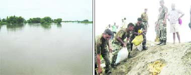A view of the Sutlej creek and (right) Army personnel use sandbags to strengthen the defence bundh at Kawanwala in the Fazilka sector