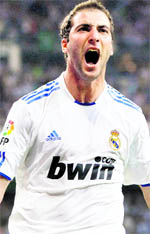 Real Madrid's Gonzalo Higuain celebrates his goal against Espanyol during their Spanish First Division soccer match at Santiago Bernabeu stadium in Madrid on Tuesday