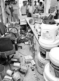 A view of the shop that was ransacked at Phase VII in Mohali on Thursday