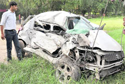 The mangled remains of the car that was hit by a bus at the Sectors 45, 46, 49 and 50 traffic lights point on Thursday