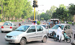Chaos at a traffic lights point near Kala Gram in Chandigarh on Thursday