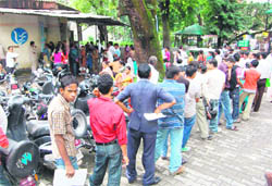 A long queue at an E-Sampark centre in Dehradun on Wednesday.