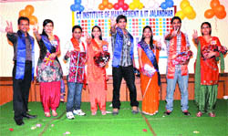 Winners pose for a photograph at the freshers party at the CT Institute of Management & IT in Jalandhar.