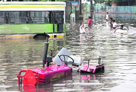 Vehicles look as if floating at the Inter-State Bus Terminus in New Delhi