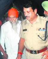 BKU president Balbir Singh Rajewal, who was observing a fast-unto-death, being taken to the PGI by the police on Thursday.
