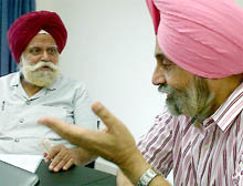Dr Jairup Singh (right), VC, Central University of Punjab, discussing a point with Prof Harbhajan Singh Soch, former VC of the Guru Nanak Dev University, during a book fair on the universitys campus in Bathinda on Friday