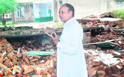 Mohali councillor Rajinder Sharma at the site of the demolished school building in Phase VI, Mohali. 