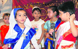   A young girl acting as a nun at a function held to celebrate the World Girls Day in Dehradun on Friday. 