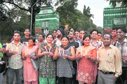 Physically challenged persons hold a candlelight procession in Dehradun