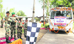 Commander of 163 Infantry Brigade AK Bhat flags off a tour of elders at Nariyan in Rajouri
