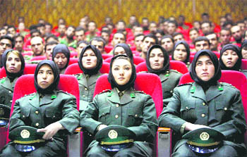 Newly trained female officers of Afghan National Army take front seats as a new batch of officers attend their graduation ceremony at National Armys training centre in Kabul on Thursday.