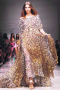 A model presents a creation as part of the Blumarine Spring/Summer 2011 women's collection during the Milan Fashion Week