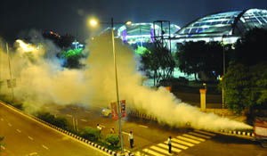 Fogging being carried out near the Indira Gandhi Stadium, one of the venues of the Commonwealth Games in New Delhi on Saturday.