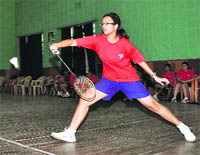 A player in action at the District Badminton Championship in Dehradun