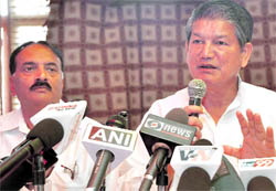 Harish Rawat, Union Minister of State for Labour and Employment, addresses a press conference in Dehradun on Saturday