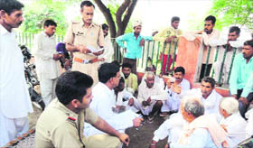 Kin of the girl, whose beheaded body was found at Phoolkan village, in the general hospital in Sirsa on Saturday.