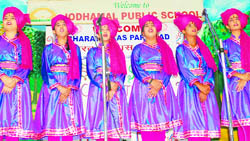 Students take part in a group song competition organised by the Bharat Vikas Parishad at Jodhamal Public School in Jammu on Saturday