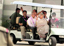Delhi Chief Minister Sheila Dikshit takes a round of the Games Village along with other officials in New Delhi on Saturday