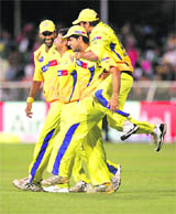 Chennai Super Kings celebrate the wicket of Royal Challengers Bangalore's Cameron White during their Twenty20 match in Durban on Friday.