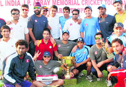 ONGC team members with the winning trophy. 