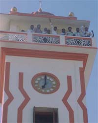The members of the Border Area Vikas Front climbed atop the upper balcony of the Clock Tower of Fazilka, in support of their demand to get district headquarters status for Fazilka