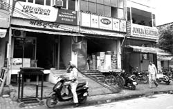A view of commercial establishments in the New Lal Bagh area on Upper Mall road in Patiala