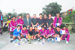 The winning team of Oak Grove with the Sixth Alok Ranjan Memorial Soccer trophy in Mussoorie on Sunday. 