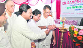 Chief Minister Ramesh Pokhriyal Nishank inaugurates a heart institute in Dehradun on Sunday.