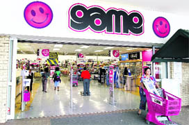 A shopper leaves the Game store in South Gate mall south of Johannesburg