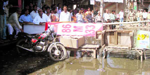 Shopkeepers block road in Rewari on Monday.