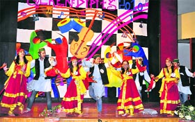 United Colours of Bedes: Students perform a dance during a competition organised by St Bedes College in Shimla on Monday.