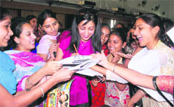 Gurleen Chopra signs autographs. She was in the city for the promotion of Punjabi film Kabaddi ek Mohabbat. 