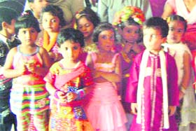 Students of Bachpan Play School in varied attires in Haridwar